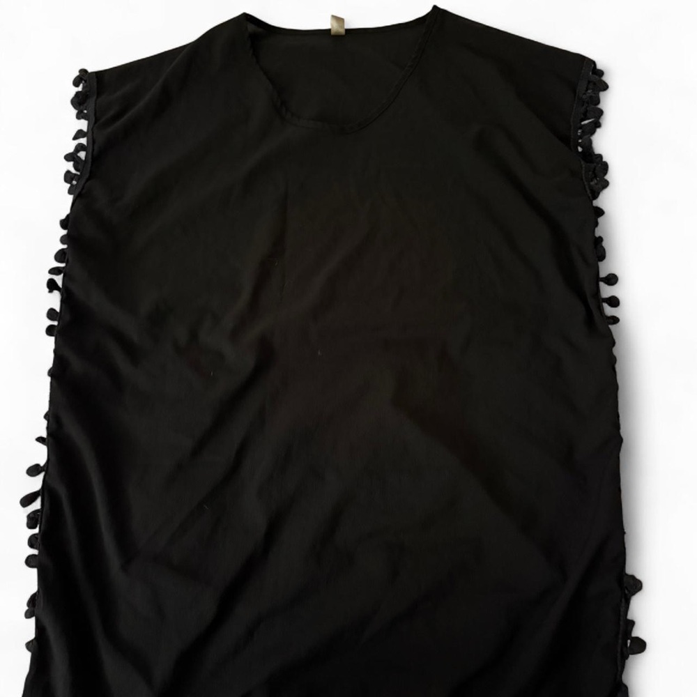 Black pom pom beach cover up. Small size.